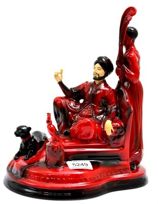 Lot 5249 - A ceramic figure by Peggy Davies, Ruby fusion 'The Sultan' 8/100