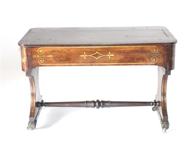 Lot 902 - A Regency Rosewood and Brass Inlaid Library Table, early 19th century, the top inlaid with a...