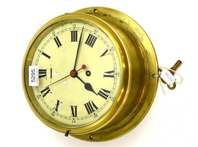 Lot 5295 - A brass ships type bulk head timepiece with centre seconds