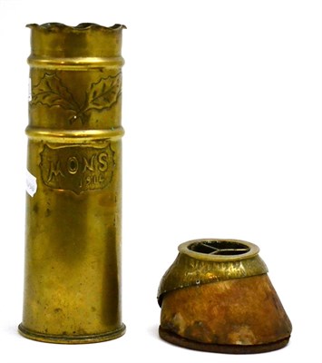 Lot 5297 - World War I trench art, Christmas vase and horse hoof with inscription