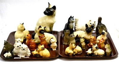 Lot 5298 - A large quantity of Beswick Cats including Siamese and Persian models, kittens and Royal...