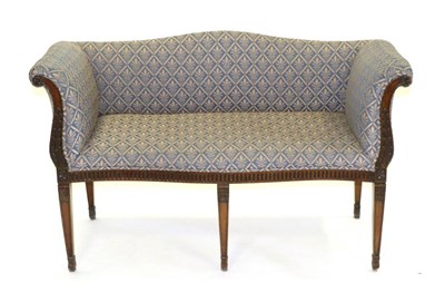 Lot 911 - A Carved Mahogany Bedroom Sofa, 19th century, in Adam style, upholstered in blue and gold...