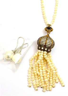 Lot 5320 - A cultured pearl necklace with tassel drop and a pair of drop earrings