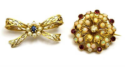 Lot 5321 - An opal, garnet and diamond circular brooch and a sapphire and seed pearl bow brooch (2)