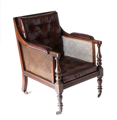 Lot 914 - A George IV Mahogany Framed Berg&egrave;re, 2nd quarter 19th century , upholstered in...