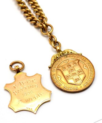 Lot 5343 - A double Albert watch chain, each link stamped '375', with attached 9ct gold ";North Riding...