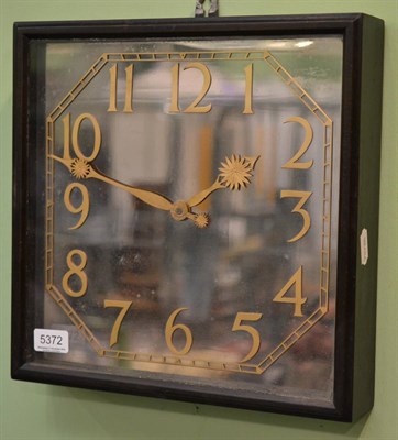 Lot 5372 - An Art Deco electric mirror dialled wall timepiece