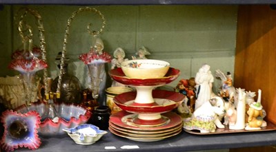 Lot 5392 - A shelf of decorative ceramics and glass including an epergne, a Limoges part dessert service,...