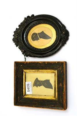 Lot 5409 - Oval silhouette portrait depicting a young man wearing a ruff, contained within carved oval...