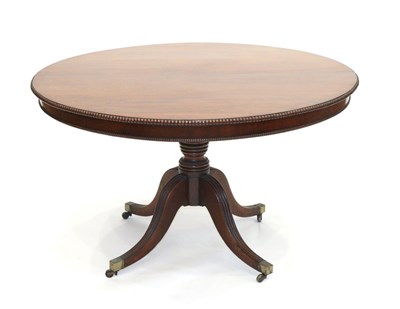 Lot 930 - A Late George III Mahogany Circular Dining or Breakfast Table, circa 1820, with gadrooned...