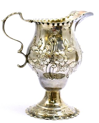 Lot 5417 - A George III silver cream jug, London 1777