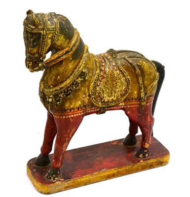 Lot 5432 - A 19th century painted wooden horse, possibly South American