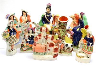 Lot 5446 - Collection of eight Staffordshire pottery figure groups