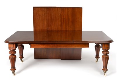 Lot 938 - A Victorian Mahogany Wind-Out Dining Table, circa 1850, with four original leaves with moulded edge