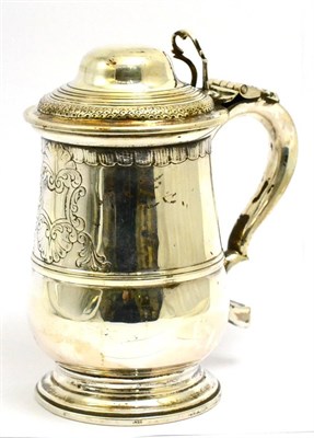 Lot 5478 - A .800 silver tankard, 20th century, in the George III style with high domed cover, S scroll handle