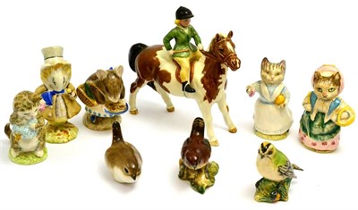 Lot 5483 - A Beswick figure of a girl on a skewbald pony, a Beswick Beatrix Potter figure of Tabitha Twitchett