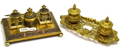 Lot 5484 - Two Victorian brass inkstands