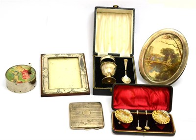 Lot 5485 - A cased pair of silver shell salts, a cased silver Christening set, two silver photograph frames, a