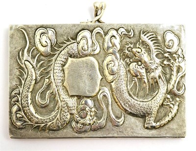 Lot 5503 - A Chinese export silver card case, one side decorated with a dragon, the other with bamboo