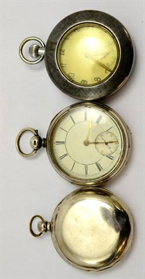 Lot 5529 - A silver full hunter pocket watch, a silver open faced pocket watch and a plated military...