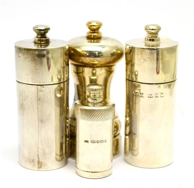 Lot 5535 - Two similar silver pepper mills and two others