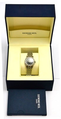 Lot 5543 - A lady's stainless steel calendar centre seconds wristwatch, signed Raymond Weil, Geneve, with...