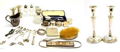 Lot 5548 - A group of silver jewellery and other items including candlesticks, napkin rings, dressing...