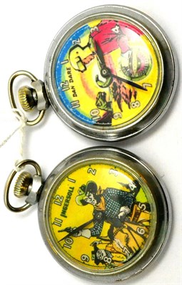 Lot 5576 - Two character Ingersoll pocket watches - Dan Dare and Jeff Arnold