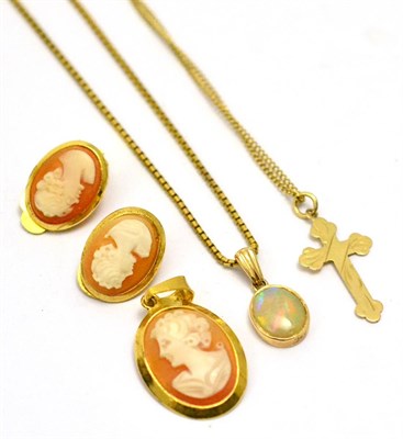 Lot 5592 - A 9ct gold and opal pendant and chain; a 9ct gold cross and chain; a 9ct gold and shell cameo...