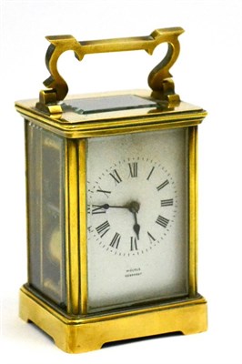 Lot 5611 - A brass cased carriage clock chiming a gong