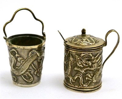 Lot 5618 - A Chinese export silver mustard pot with spoon; and bucket by Wang Hing, each decorated with a...