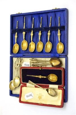 Lot 5630 - A cased set of six silver gilt ";Anointing"; teaspoons; a similar single cased spoon; two sets...