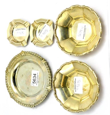 Lot 5634 - A pair of Walker & Hall silver dishes, two silver ashtrays and a silver coaster