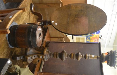 Lot 6024 - Oak circular snap-top table, a Continental standard candlestick and a coopered oak barrel and cover