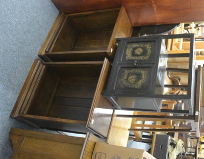 Lot 6032 - A small ebonised Chinese style side cabinet, together with two modern oak small bookcases (3)