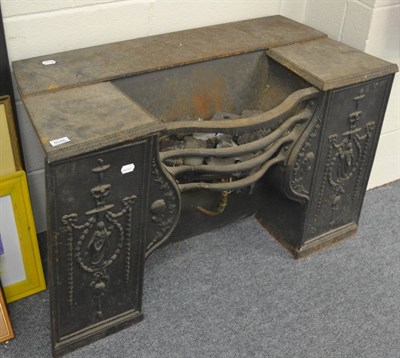 Lot 6045 - A period style cast iron gas fire insert