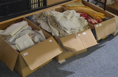 Lot 6057 - Assorted white linens, embroidered textiles, chenille clothes, curtains, fabrics, roll of cream...