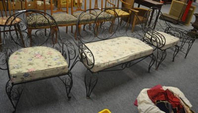 Lot 6133 - Four piece wirework conservatory suite comprising two-seater bench, pair of armchairs and a...