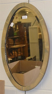 Lot 6146 - An Art Deco oval shagreen wall mirror, with bevelled edge plate glass, 40cm by 65cm