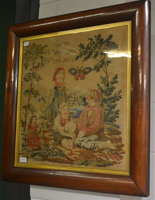 Lot 6177 - A Victorian woolwork picture, figures by a lake with a butterfly, worked in cross stitch by...