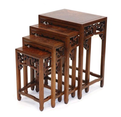 Lot 990 - A Set of Four Chinese Hardwood and Crossbanded Nesting Tables, 20th century, of graduated...