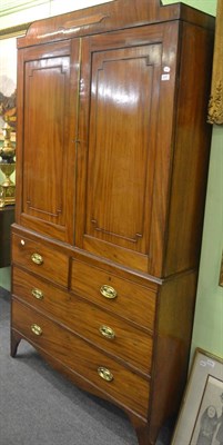 Lot 6257 - A Georgian mahogany linen press