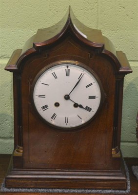 Lot 6260 - A mahogany inlaid striking table clock