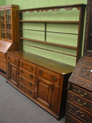 Lot 6271 - An 18th century oak dresser base with associated plate rack