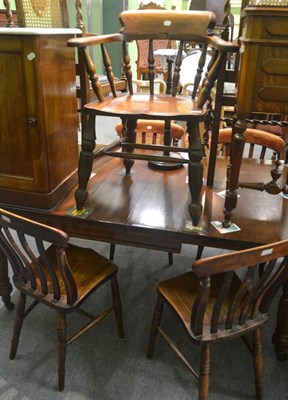 Lot 6278 - A set of four ash and elm lath back dining chairs, a smokers bow armchair, a telescopic dining...