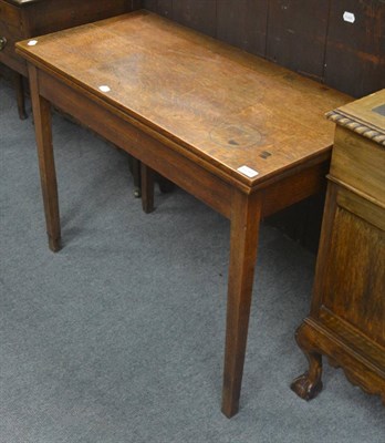 Lot 6293 - Georgian oak fold-over tea table