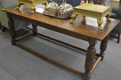 Lot 6308 - An oak refectory table with carved legs