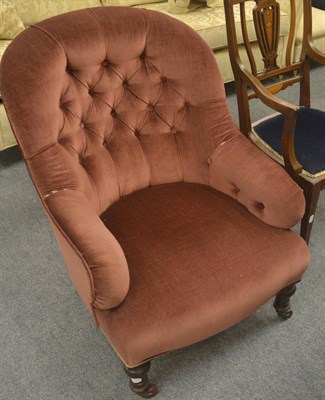 Lot 6316 - A Victorian mahogany framed button back nursing chair and an Edwardian inlaid open armchair