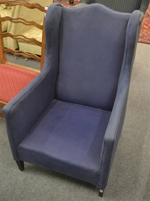 Lot 6319 - A 19th century mahogany framed wing armchair with blue linen upholstery