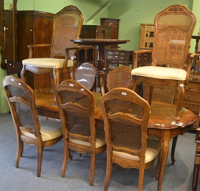 Lot 6337 - A modern dining room suite together with eight matching chairs (including two carvers)